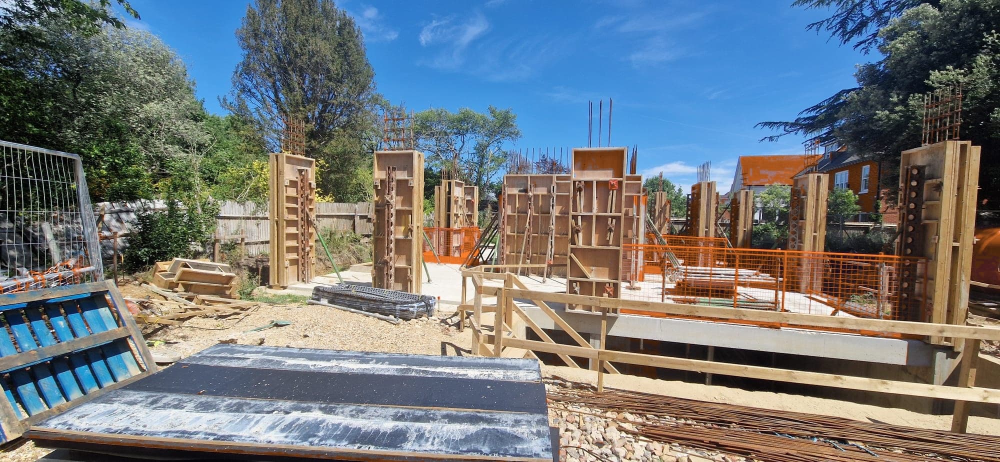 Wide view of basement column formwork installation for the RC frame development in Kingston