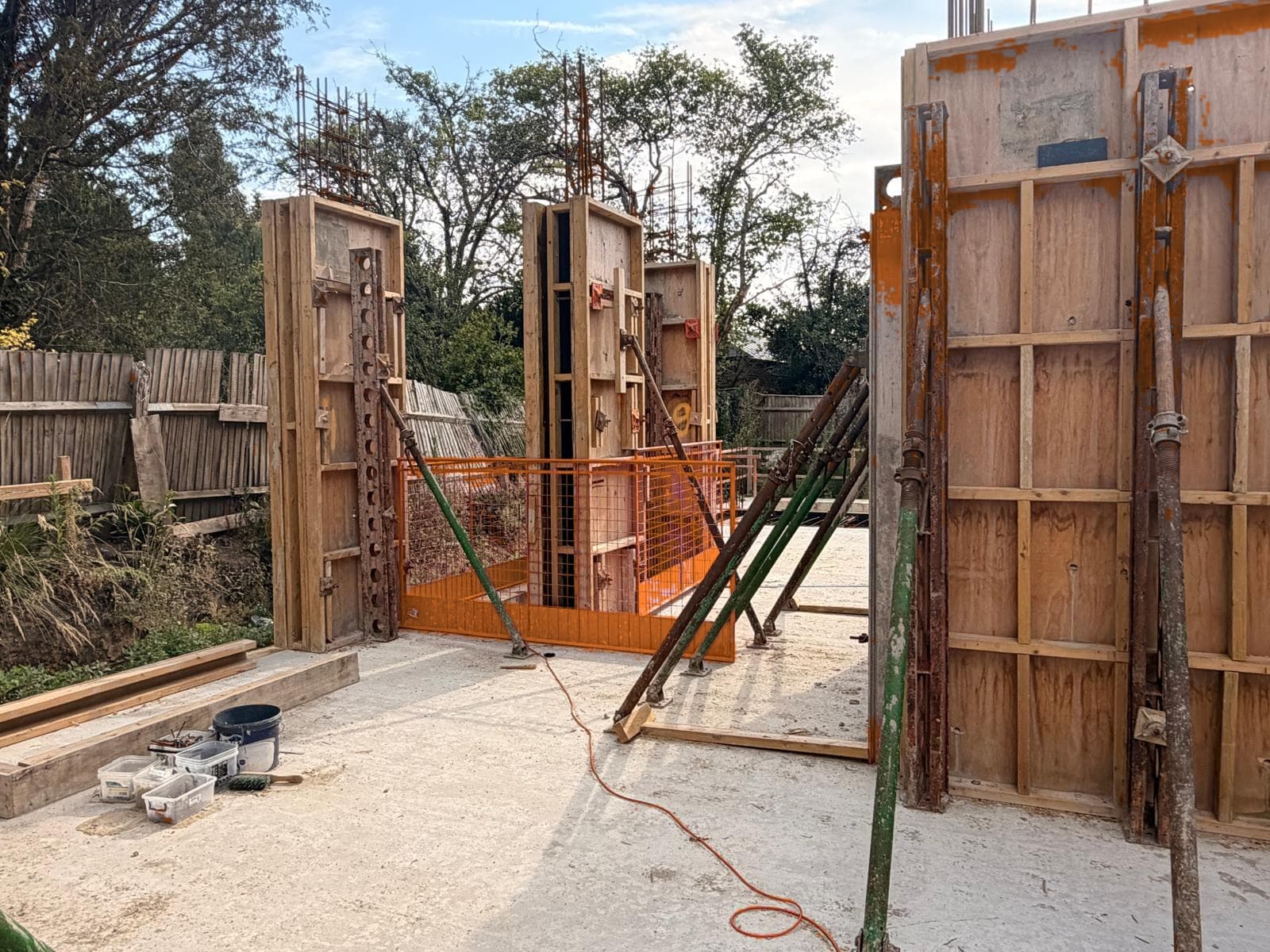Reinforced concrete column shuttering and support props on site