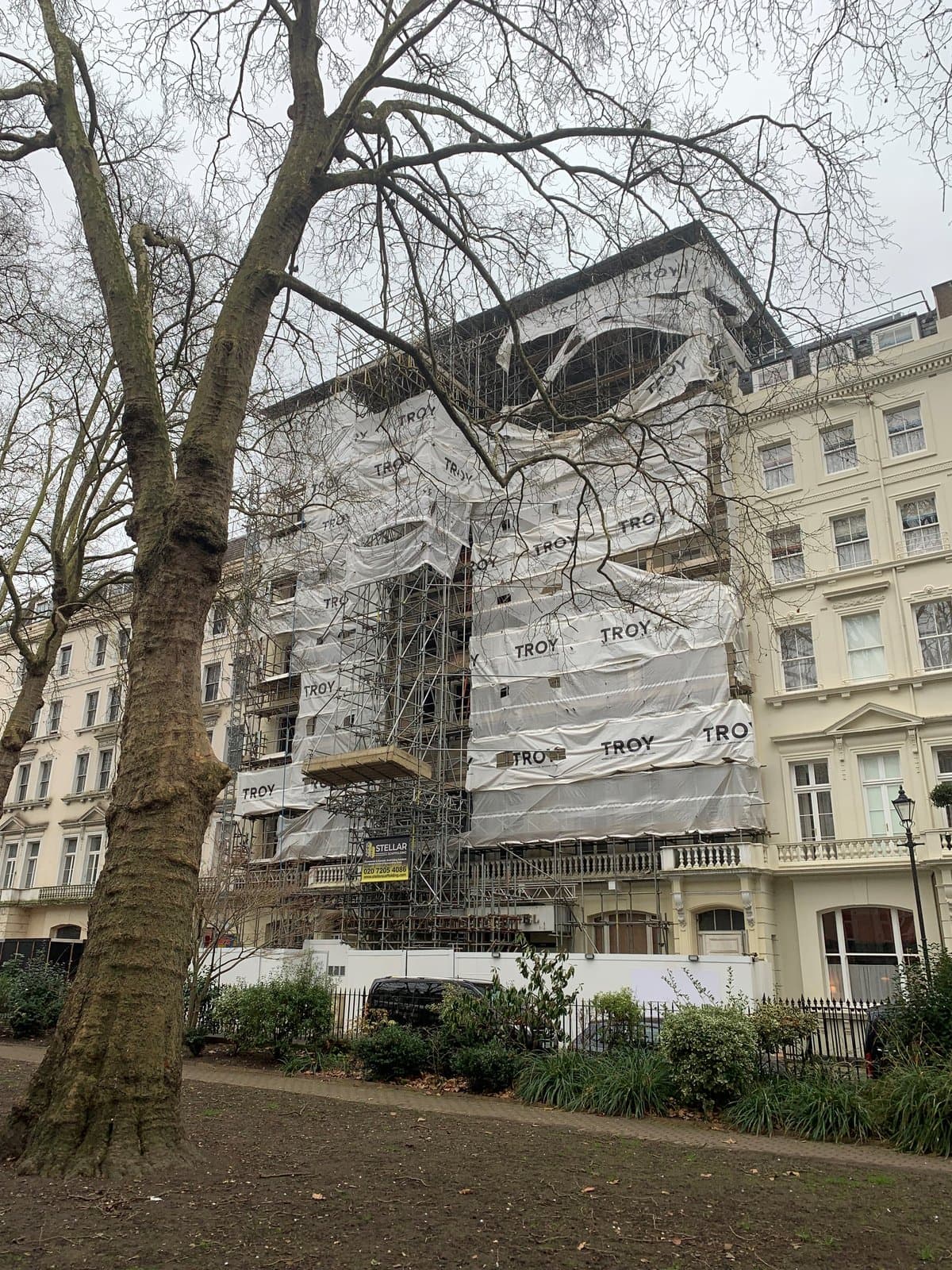 Scaffolded façade of the hotel under refurbishment in Paddington, London