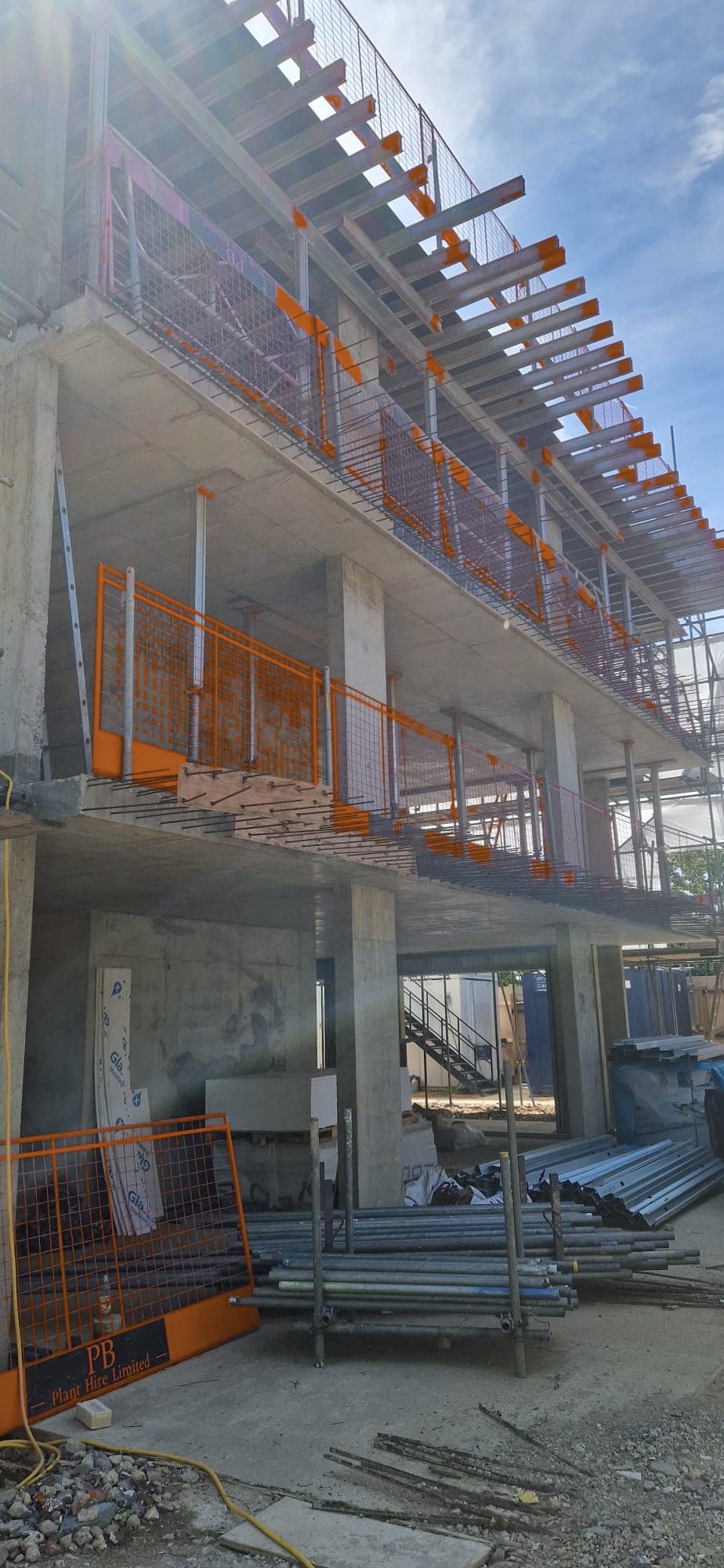 Corner perspective of the multi-storey reinforced concrete frame and slab propping