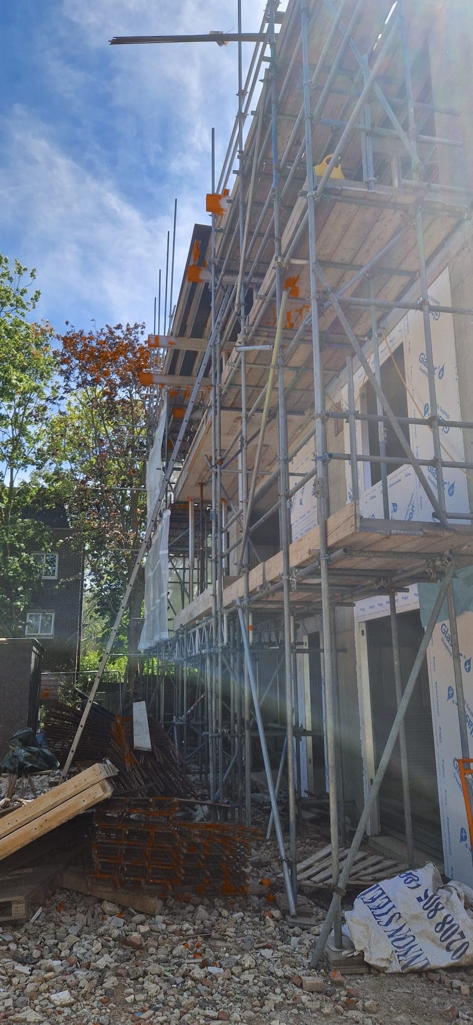 Side elevation of the reinforced concrete frame structure showing successive floor levels