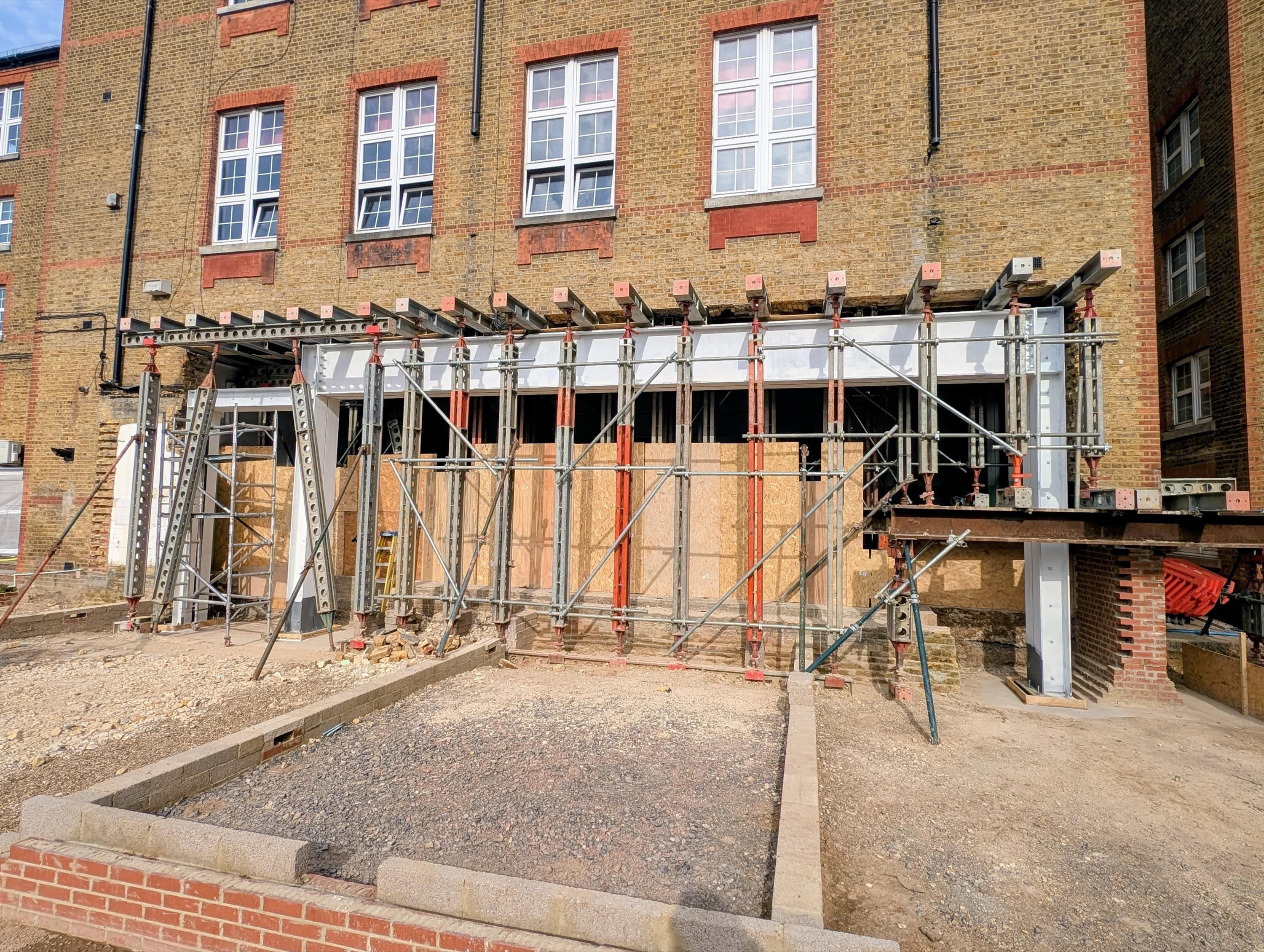 The 11m-long permanent steel beam fully installed below the retained structure