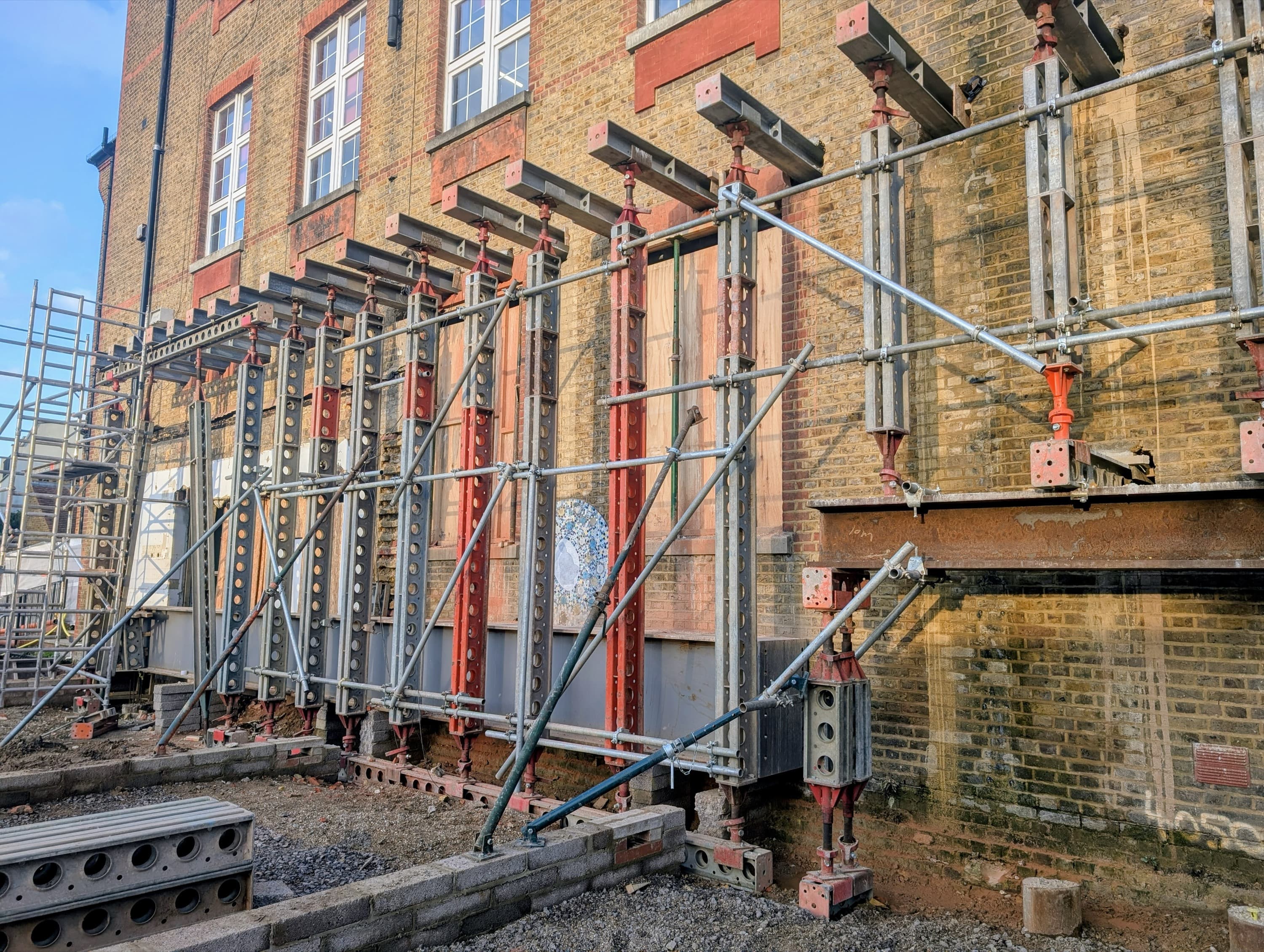 External line of Slimshore props supporting the facade during alterations