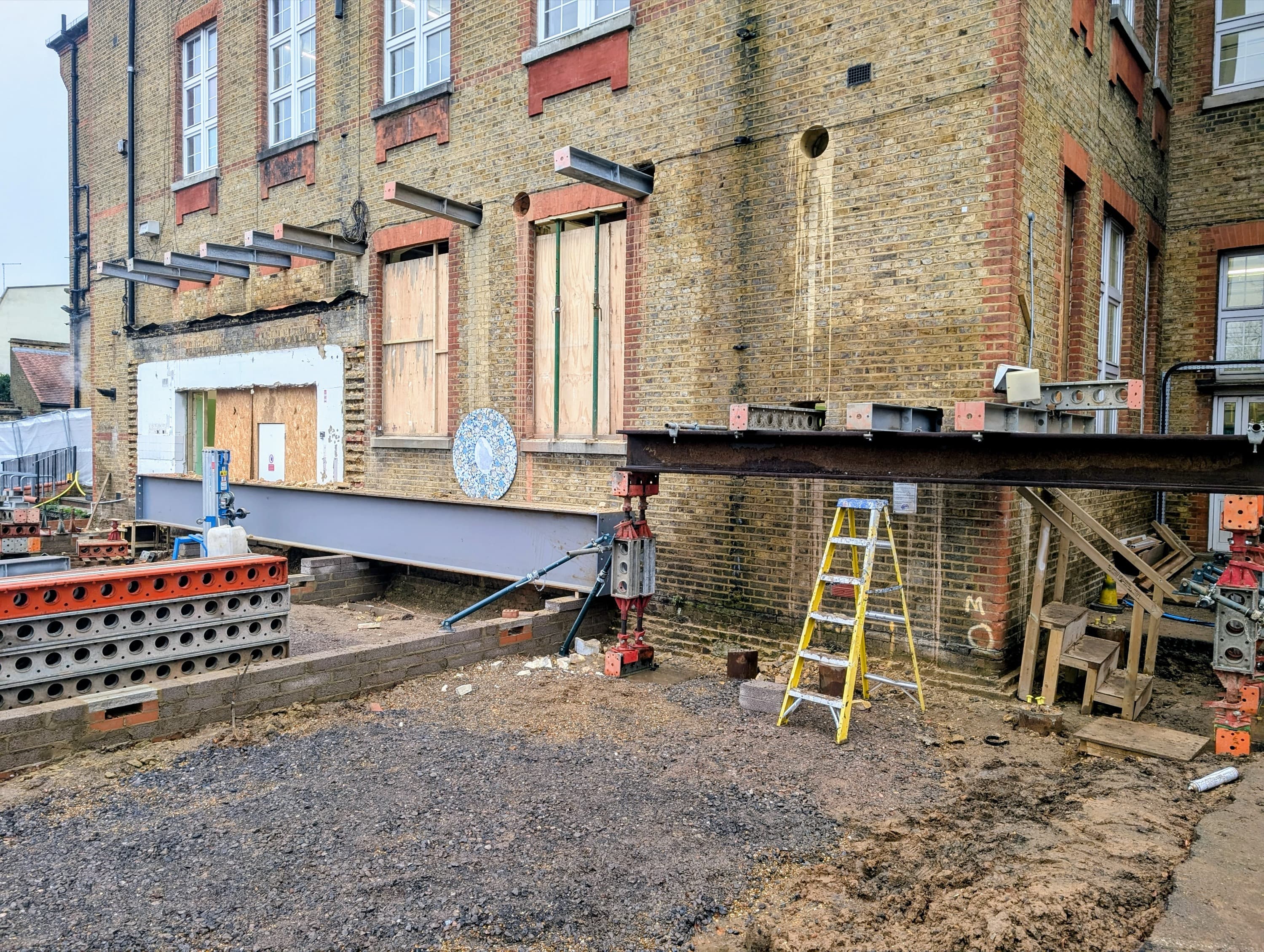 Close up of the 203x203 UC needle beams spanning the masonry wall
