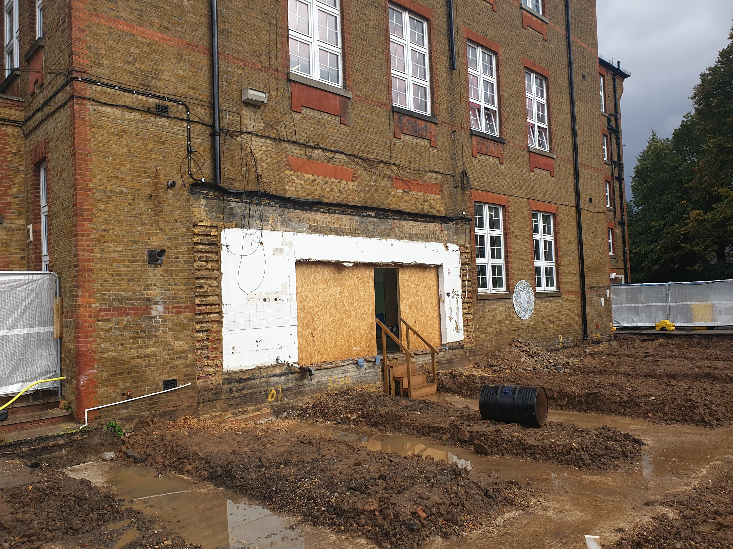 Existing brick wall at the Chiswick school before structural opening works