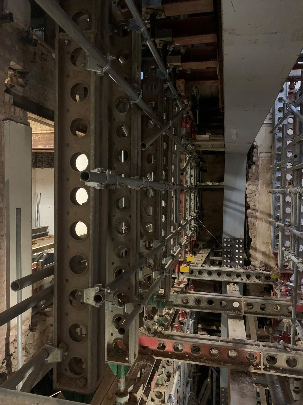 Slimshore soldier tower viewed from below during the ground-floor column removal