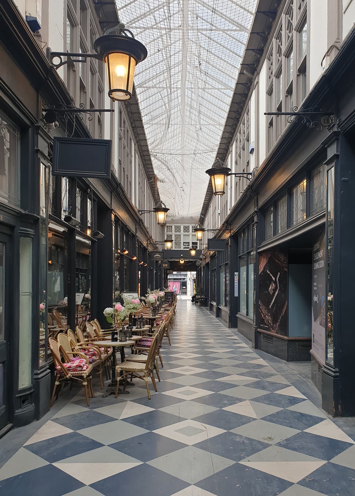 Grade II listed High Street Arcade in Cardiff, with its glazed roof, lanterns and chequered floor